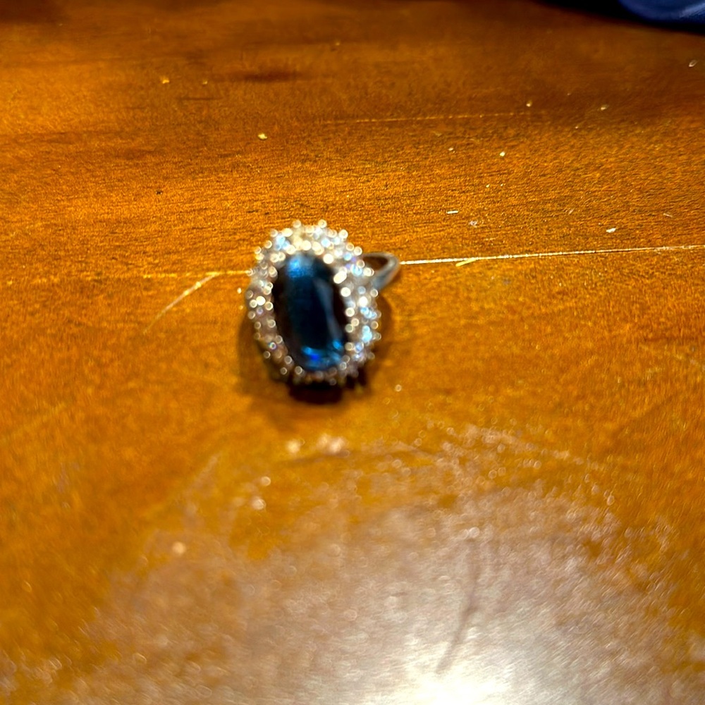Beautiful women’s ring. Steel with large blue stone